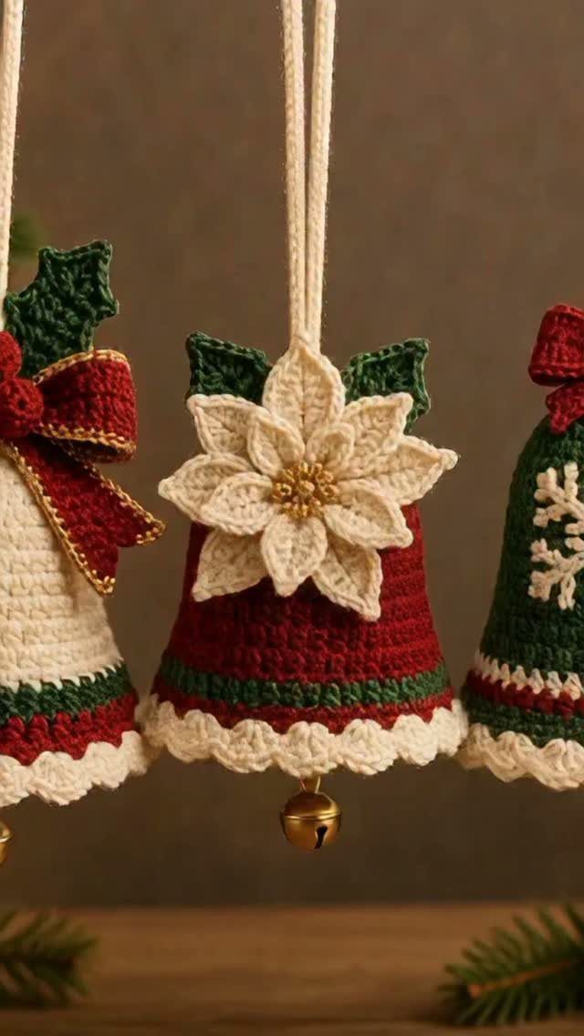 Crocheted Christmas bell ornaments in red, white, and green with a floral detail.