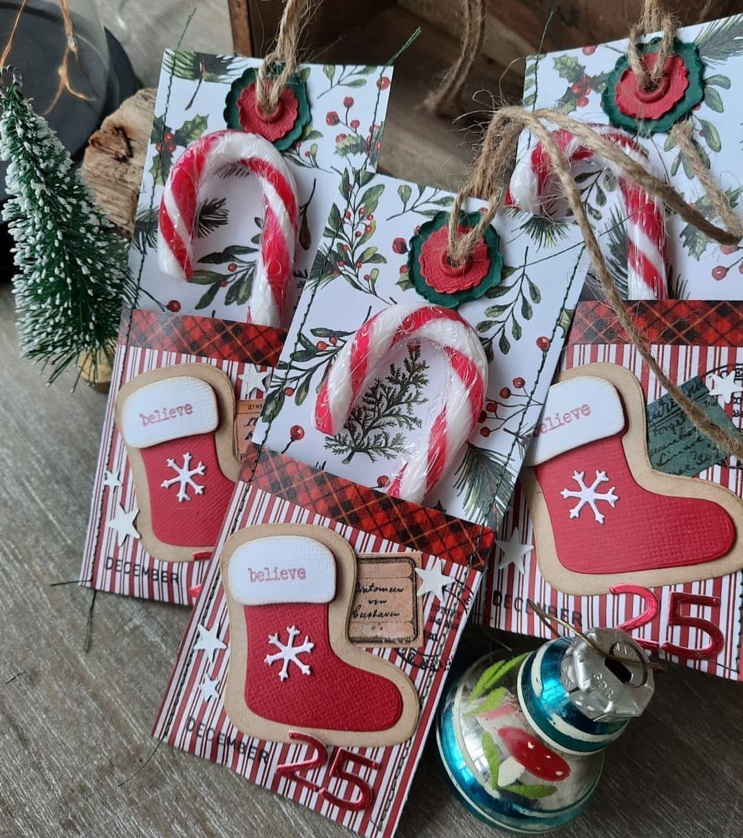 Handmade Christmas gift tags with candy canes, red stockings, and festive plaid patterns.