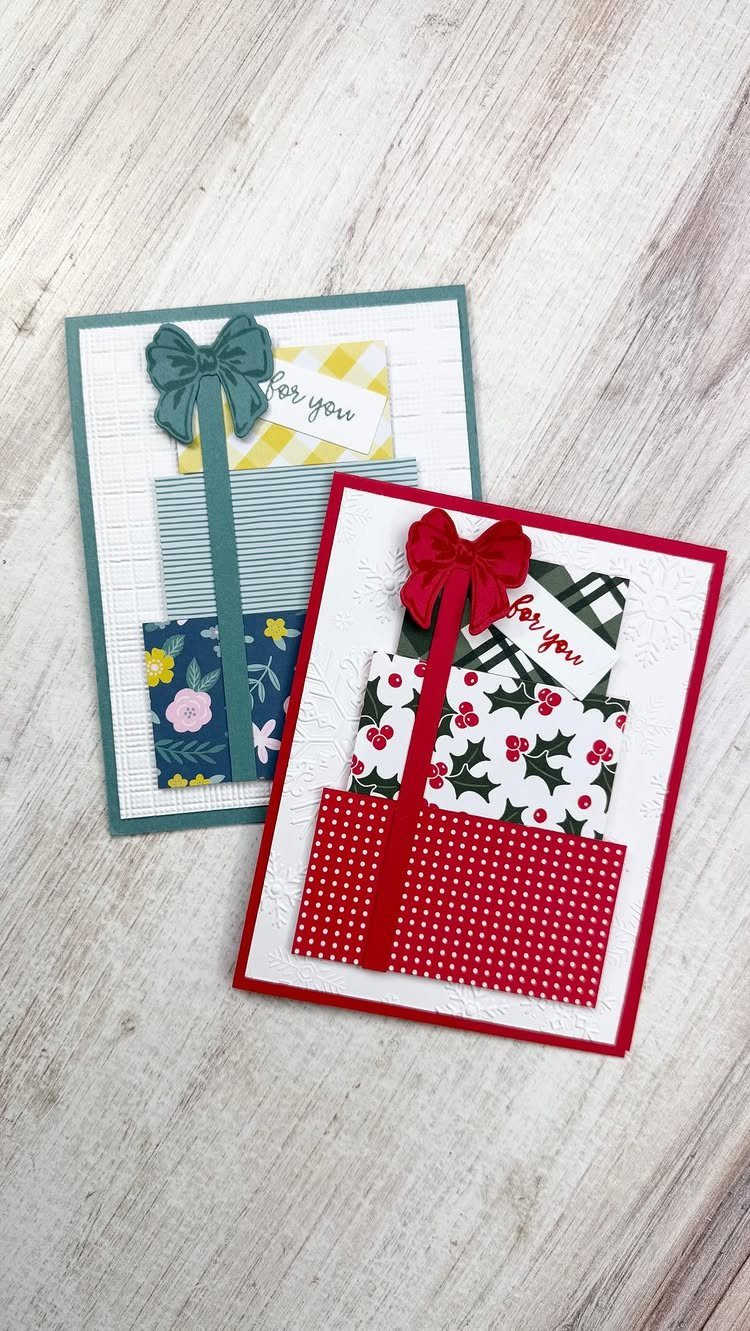 Two handmade Christmas cards with layered paper gifts and ribbons on wooden background