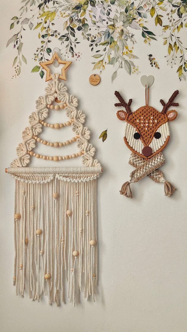 Yarn Christmas tree wall hanging and a yarn reindeer head on a wall.
