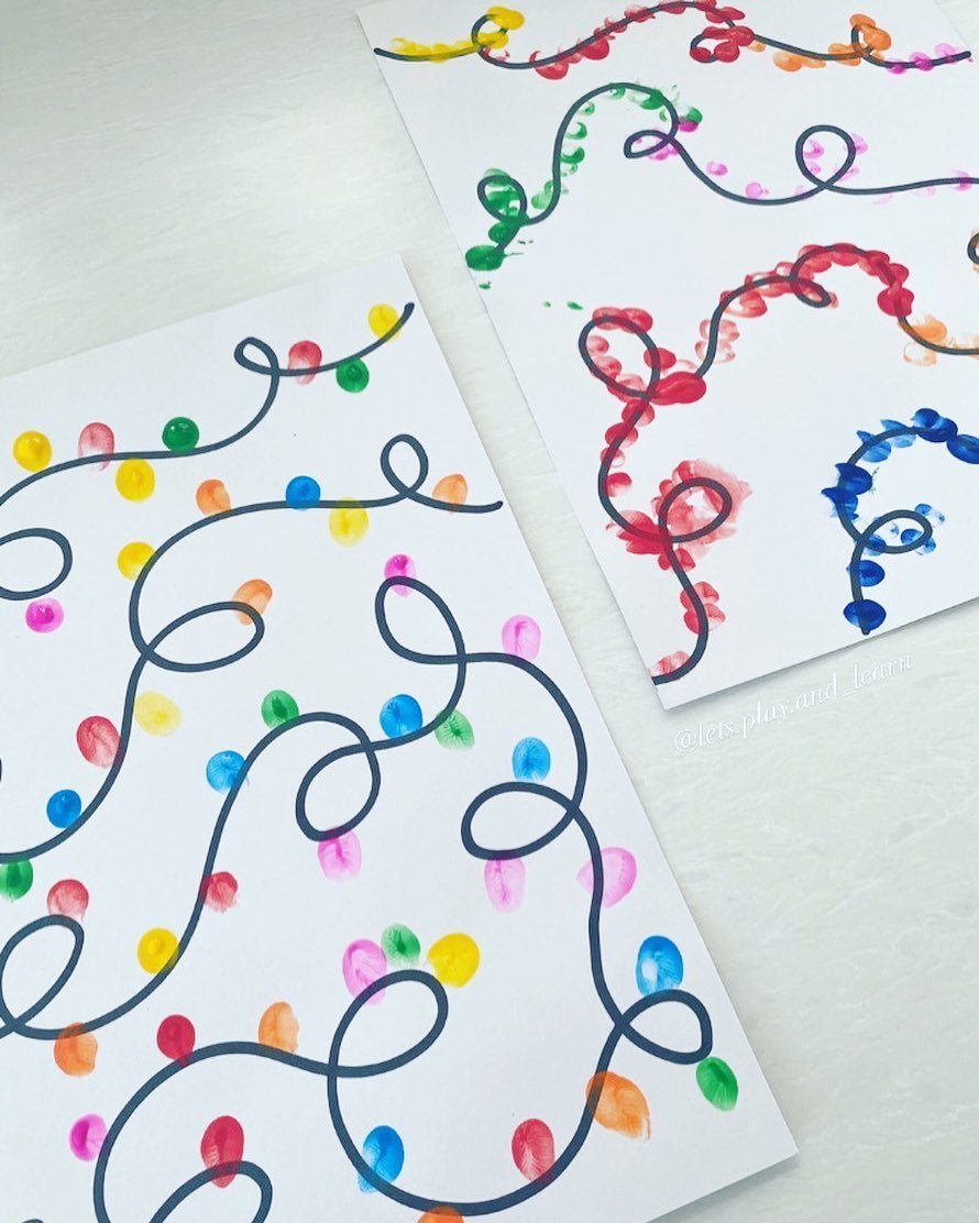 Colorful fingerprint light bulbs on curly black strings on white cards.