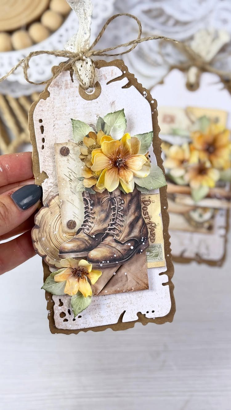 Vintage gift tag with brown boots and yellow flowers tied with twine.