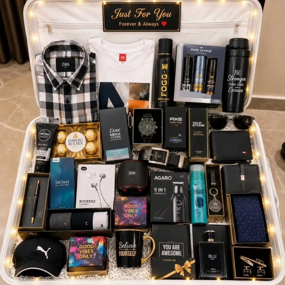 Open white suitcase filled with curated men's gifts, clothing, and grooming products.