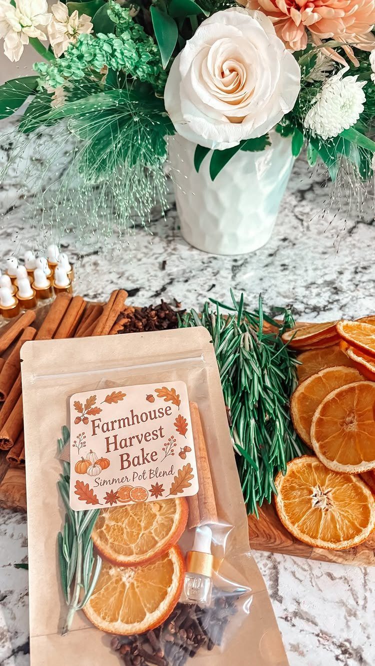 Dried orange slices and cinnamon sticks in a labeled potpourri gift bag.