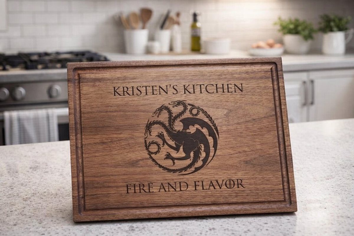 Engraved wooden cutting board with dragon logo and custom text on kitchen counter
