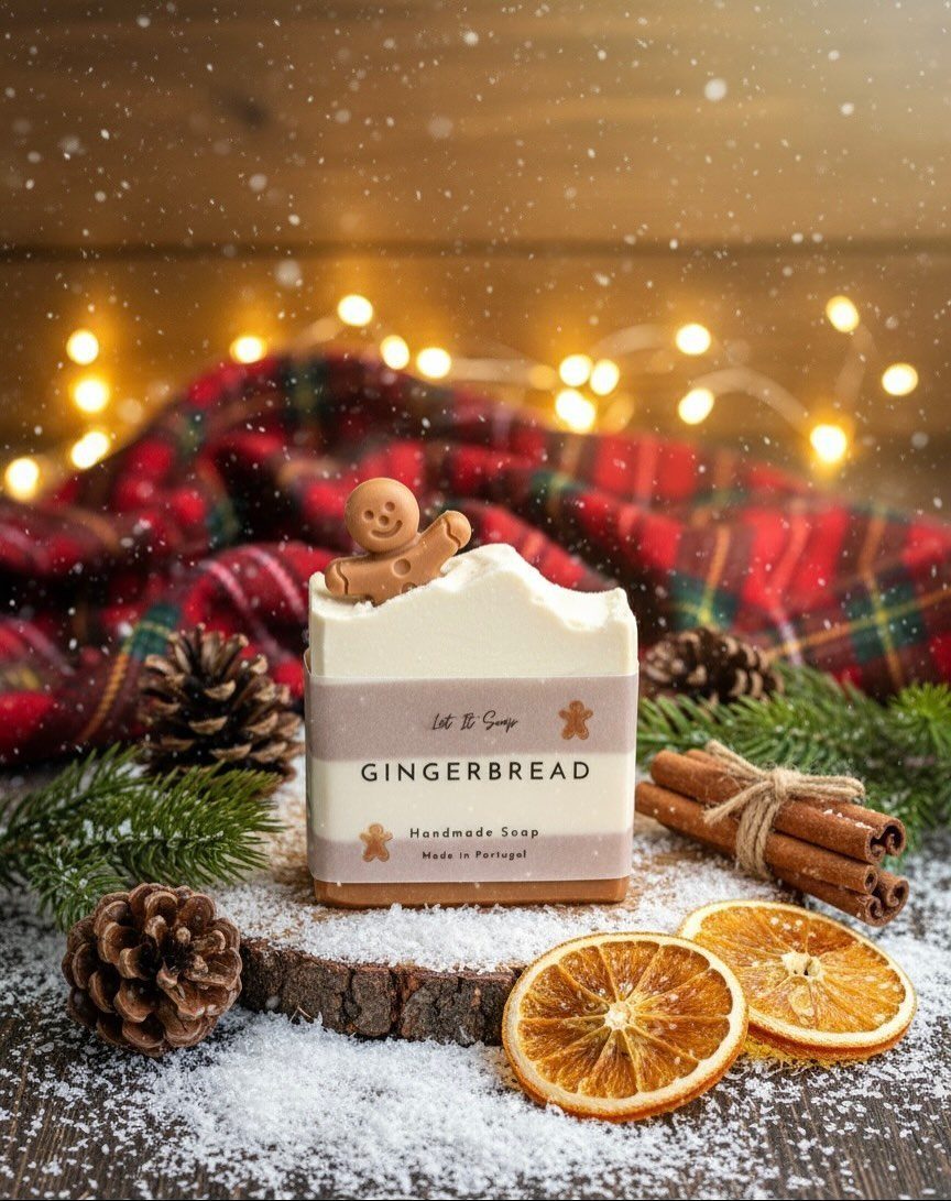Handmade gingerbread soap with a small gingerbread man on a festive winter scene