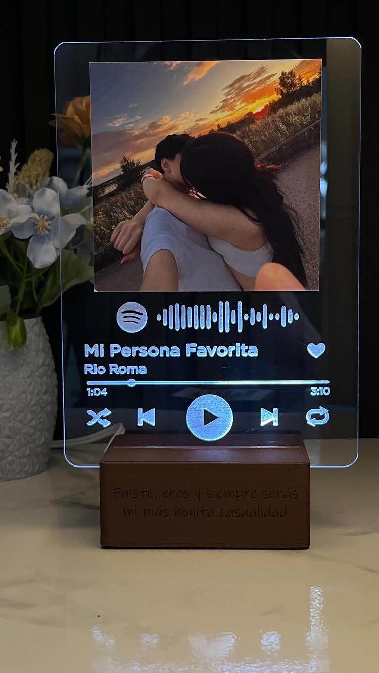 Acrylic music plaque with a couple's photo and Spotify interface on wooden base