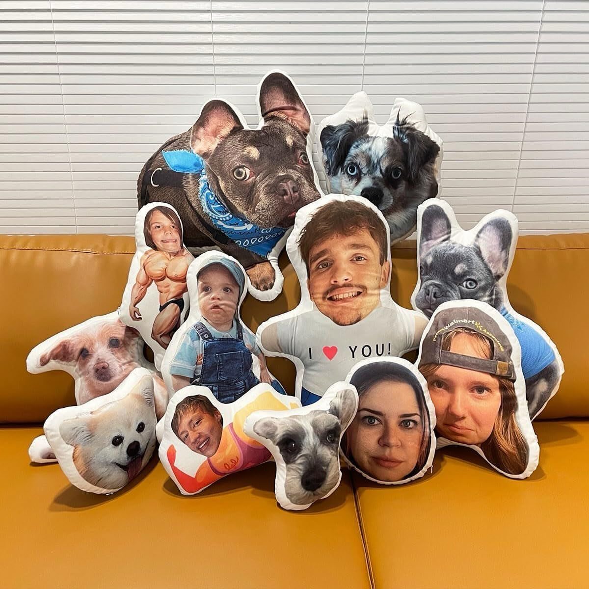 Custom shaped pillows with printed photos of pets and people on a sofa
