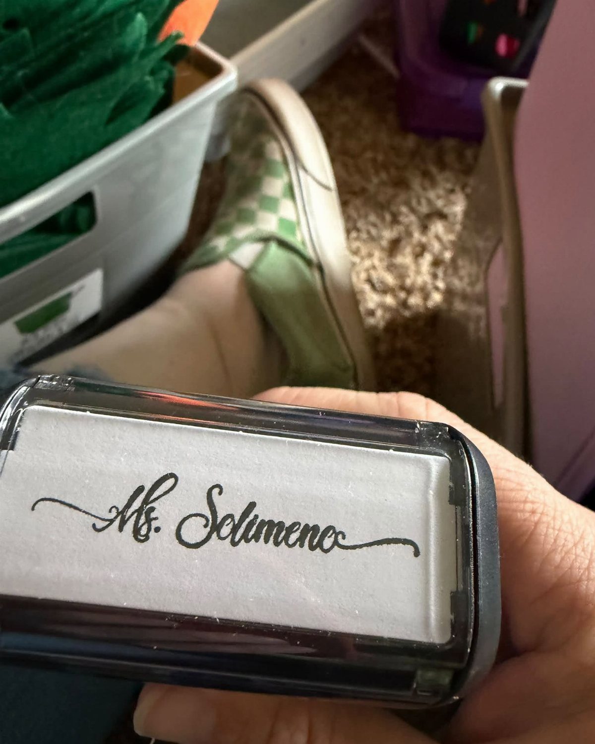 Personalized rubber stamp showing the name Ms. Solimeno in black cursive script.