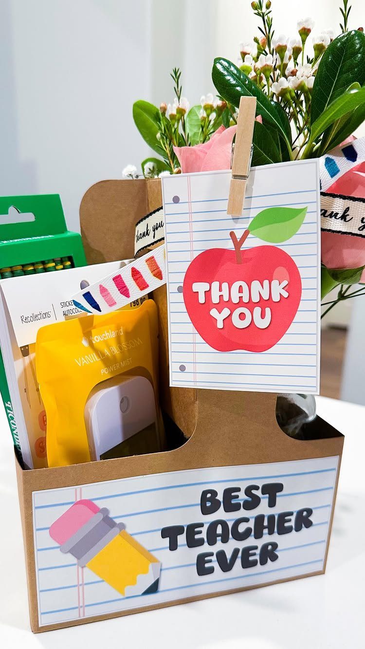 Teacher gift bin with classroom supplies and a thank you apple tag.