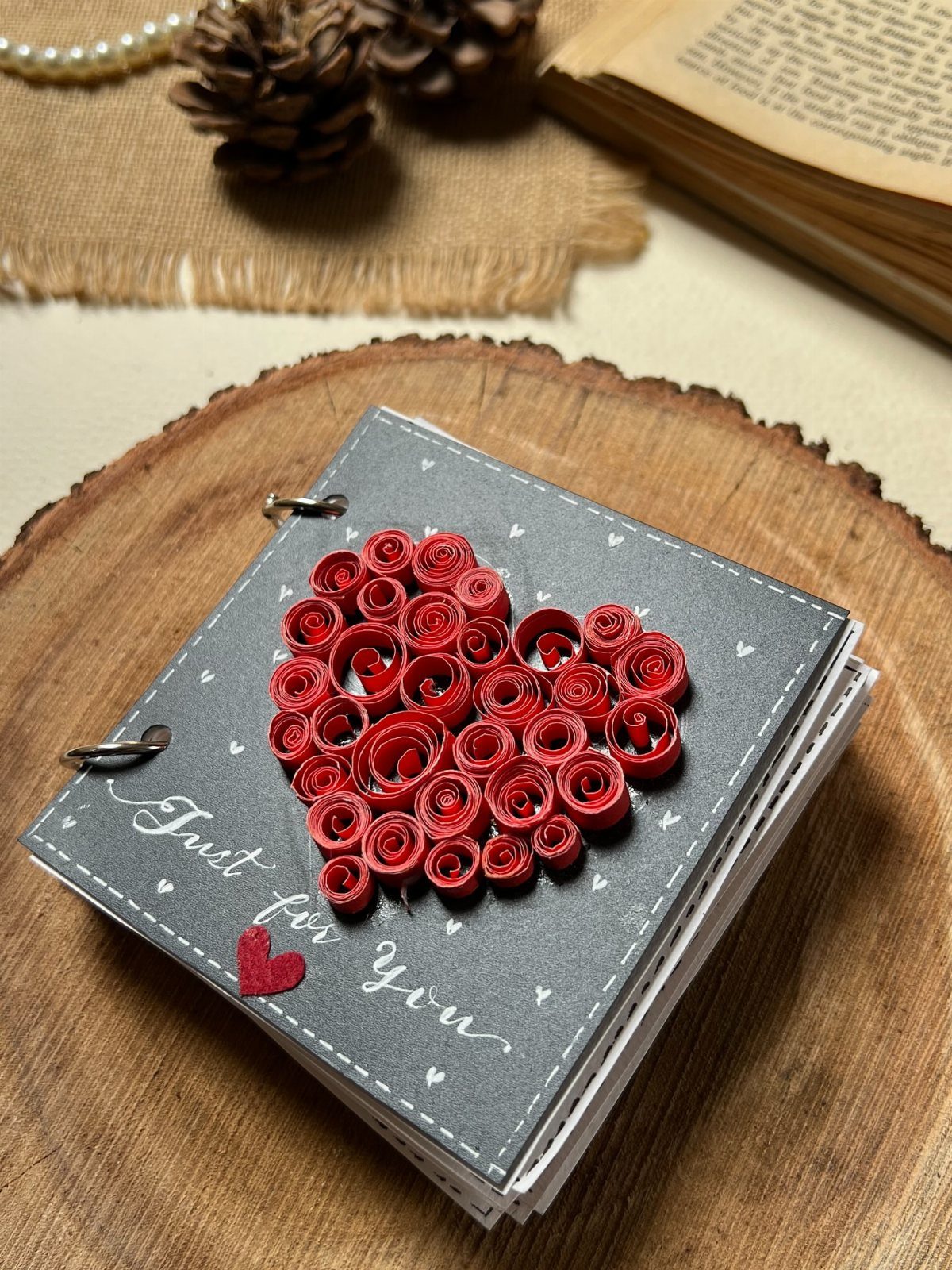 Handmade grey notebook with a red quilled paper heart and Just for You text.