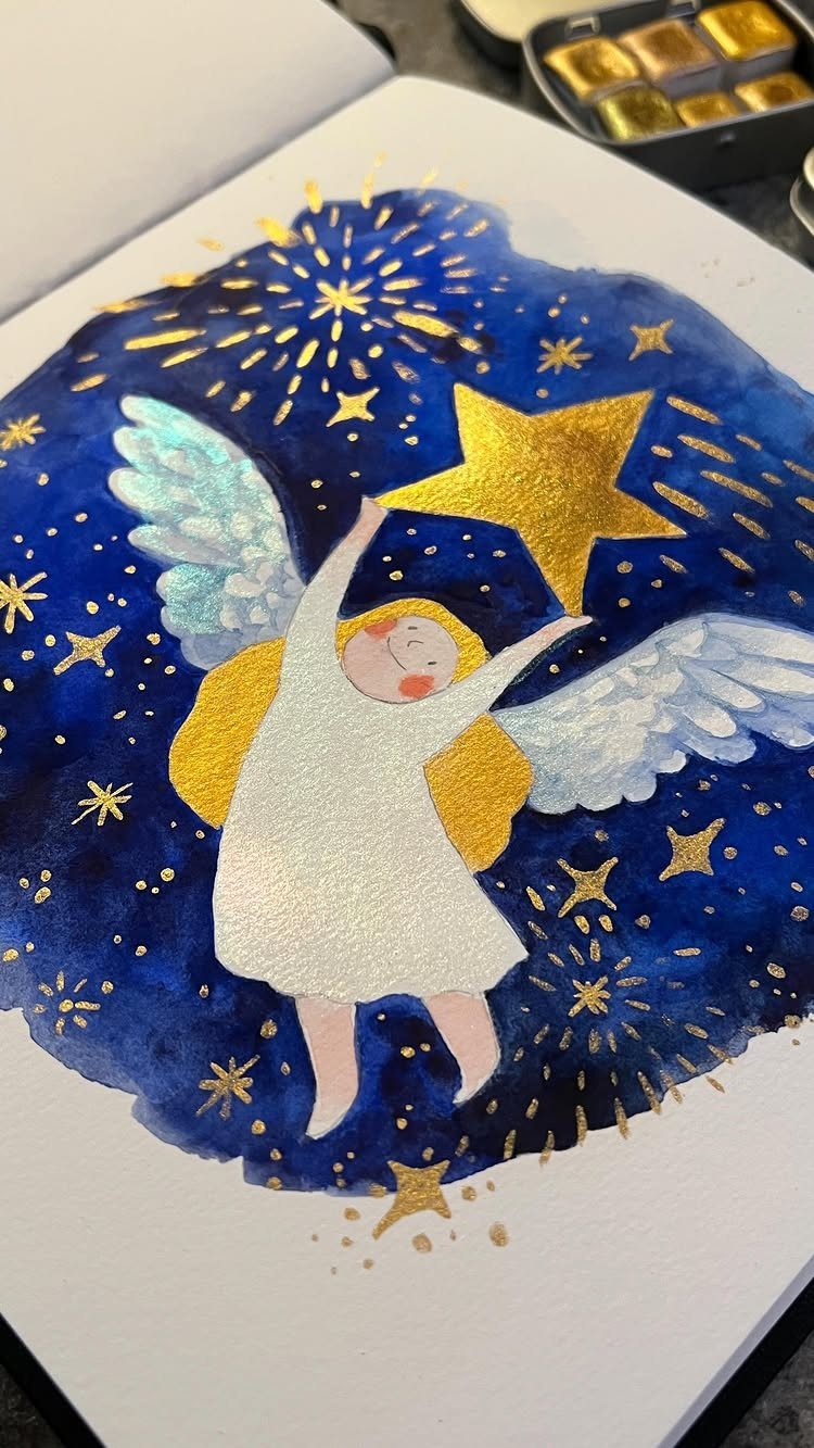 Watercolor angel with white wings holding a gold star against a blue night sky